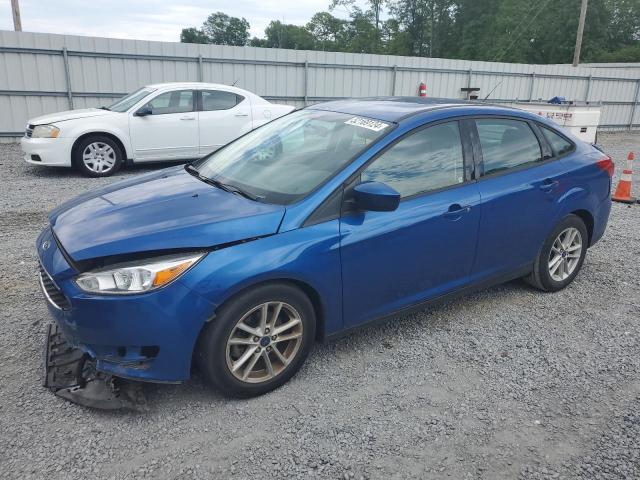 FORD FOCUS SE 2018 with VIN 1FADP3F26JL220174 - Photo from auction