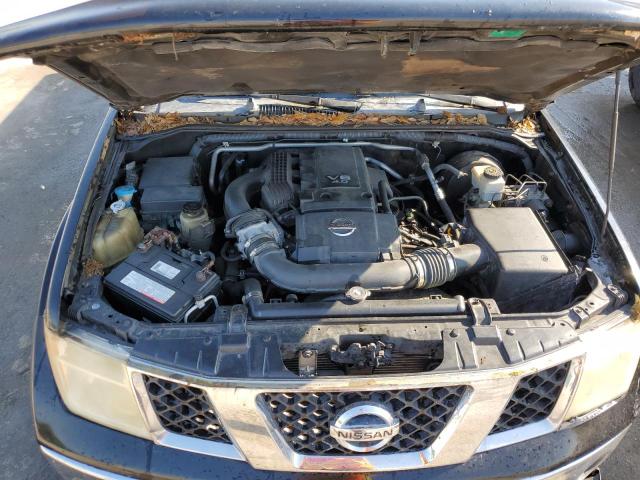 Photo 11 from auction – 2006 NISSAN FRONTIER K with VIN 1N6AD06U86C415817