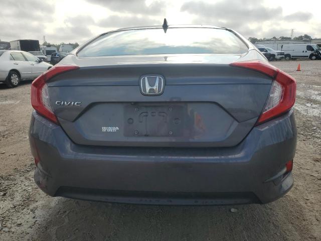 Photo 6 from auction – 2018 HONDA CIVIC EX with VIN 2HGFC2F79JH604520