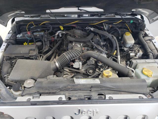 Photo 11 from auction – 2011 JEEP WRANGLER U with VIN 1J4BA5H15BL575707