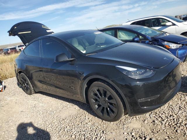 Photo 4 from auction – 2023 TESLA MODEL Y with VIN 7SAYGAEE0PF905779