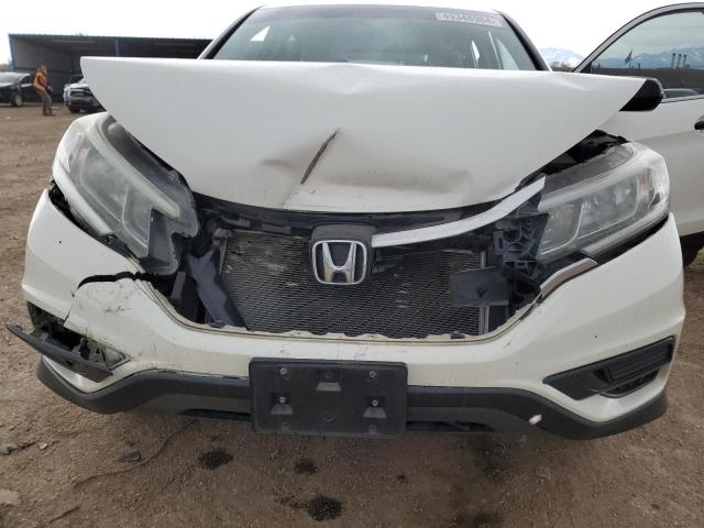 Photo 11 from auction – 2016 HONDA CR-V LX with VIN 5J6RM4H34GL113020