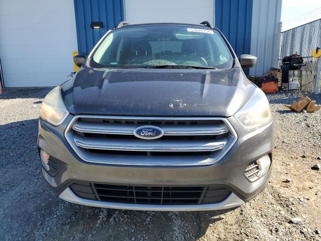 Photo 5 from auction – 2017 FORD ESCAPE SE with VIN 1FMCU9GD1HUD62014