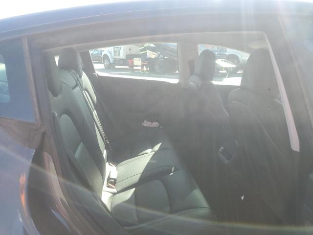 Photo 10 from auction – 2021 TESLA MODEL 3 with VIN 5YJ3E1EB9MF936706