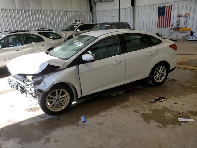 FORD FOCUS SE 2016 with VIN 1FADP3F24GL404201 - Photo from auction
