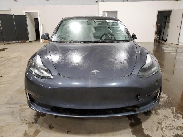 Снимка 5 от търг – 2022 TESLA MODEL 3 с VIN 5YJ3E1EC2NF337043