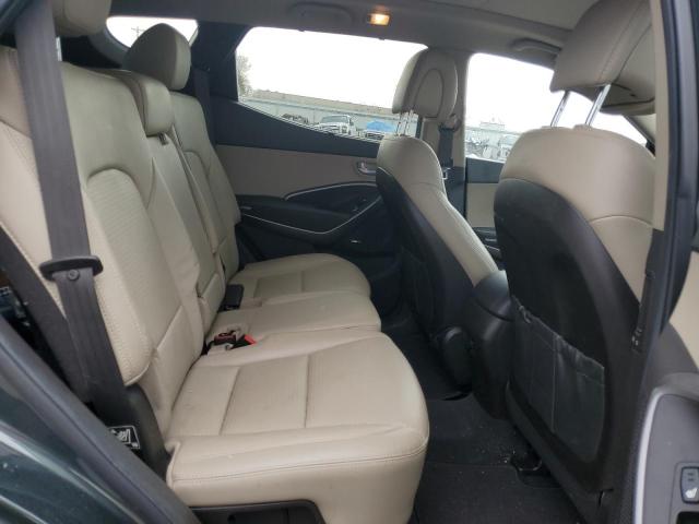 Photo 11 from auction – 2014 HYUNDAI SANTA FE S with VIN 5XYZU3LB2EG192579