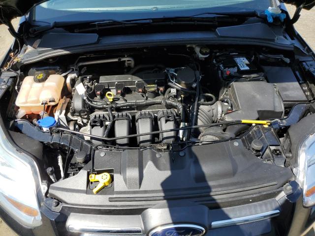 Photo 11 from auction – 2014 FORD FOCUS S with VIN 1FADP3E23EL299830