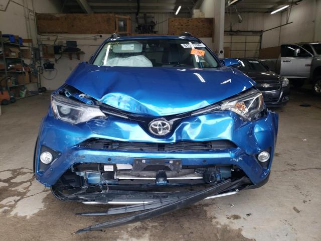 Photo 5 from auction – 2017 TOYOTA RAV4 XLE with VIN JTMRFREV2HJ111346
