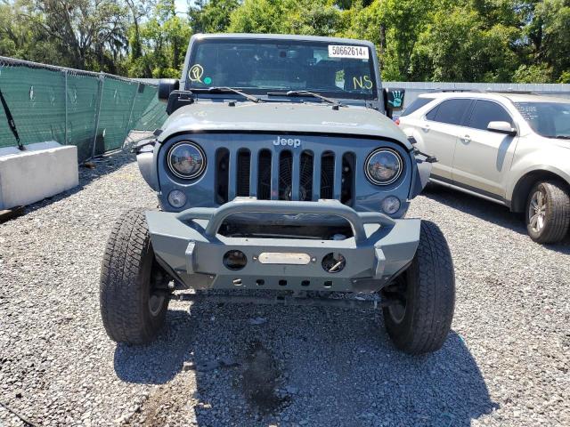 Photo 5 from auction – 2014 JEEP WRANGLER U with VIN 1C4BJWFG5EL188937