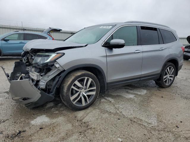 Photo 1 from auction – 2017 HONDA PILOT TOUR with VIN 5FNYF6H99HB021210
