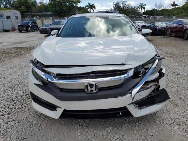 Photo 5 from auction – 2017 HONDA CIVIC EX with VIN 19XFC2F79HE069709
