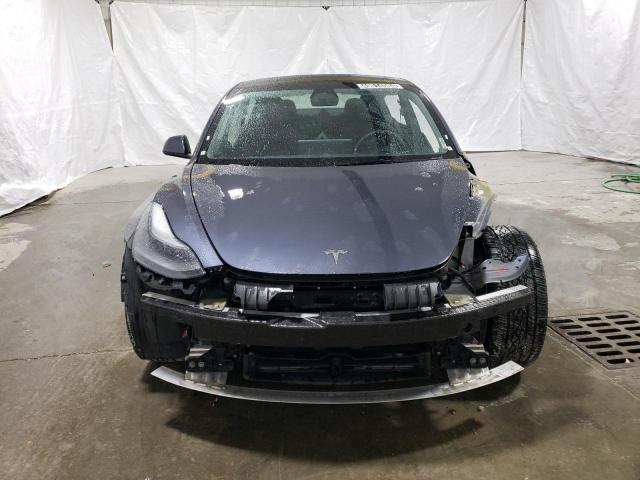Photo 5 from auction – 2022 TESLA MODEL 3 with VIN 5YJ3E1EA2NF368551