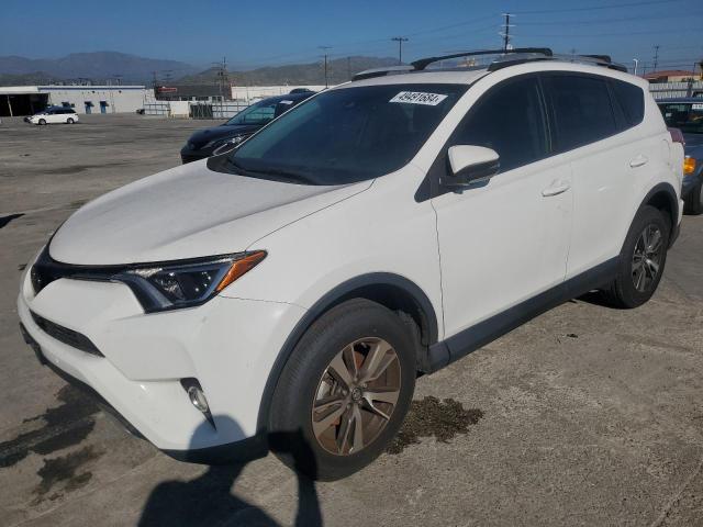 TOYOTA RAV4 XLE 2016 with VIN 2T3WFREV1GW309340 - Photo from auction