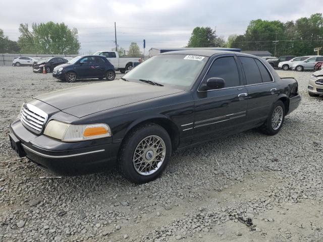 FORD CROWN VICT 1999 with VIN 2FAFP74W2XX129081 - Photo from auction
