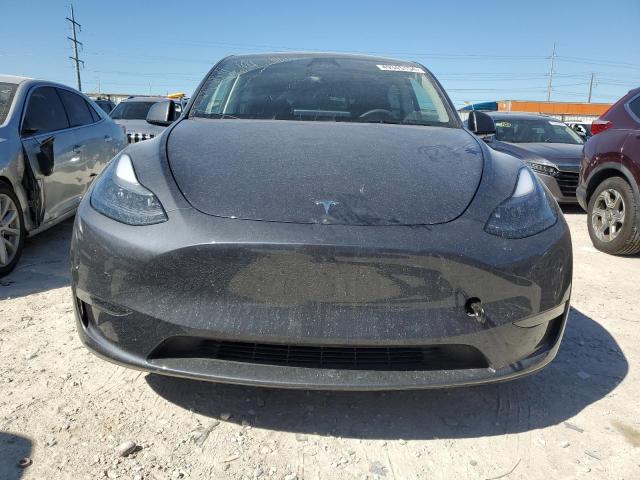 Photo 5 from auction – 2023 TESLA MODEL Y with VIN 7SAYGDED1PF947595