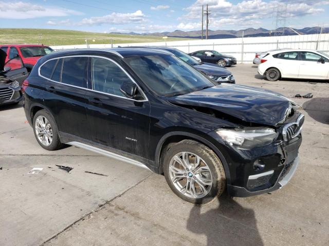 Photo 4 from auction – 2017 BMW X1 XDRIVE2 with VIN WBXHT3C31H5F82728