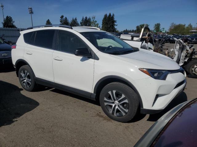 Photo 4 from auction – 2017 TOYOTA RAV4 LE with VIN JTMBFREV8HJ162478