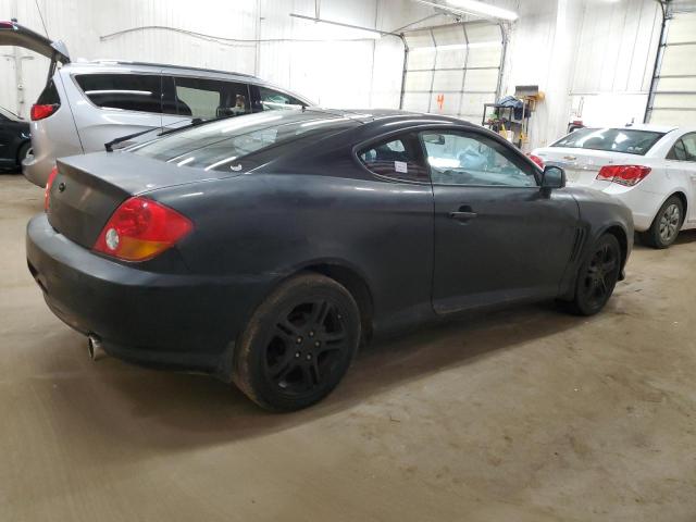 Photo 3 from auction – 2003 HYUNDAI TIBURON with VIN KMHHM65D03U037970