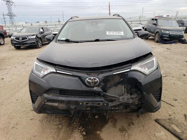 Photo 5 from auction – 2018 TOYOTA RAV4 LE with VIN 2T3BFREV7JW712518