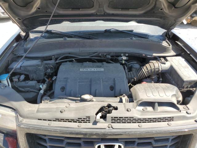 Photo 11 from auction – 2014 HONDA RIDGELINE with VIN 5FPYK1F7XEB005424