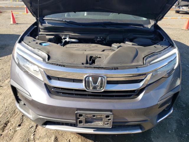 Photo 12 from auction – 2021 HONDA PILOT TOUR with VIN 5FNYF6H98MB029261