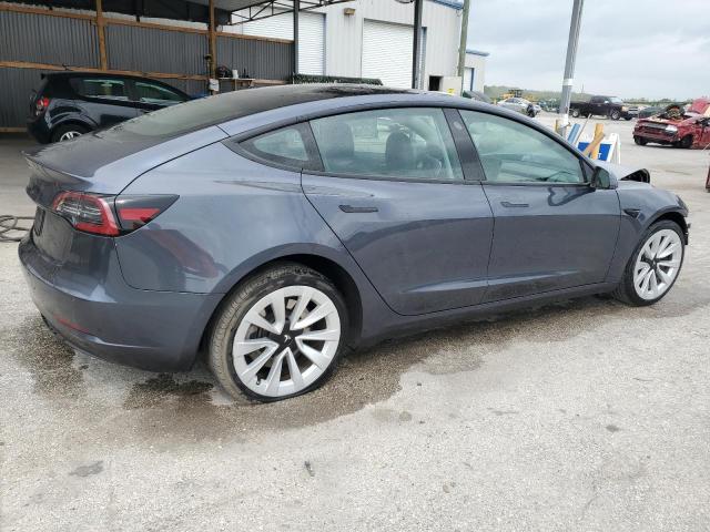 Photo 3 from auction – 2022 TESLA MODEL 3 with VIN 5YJ3E1EAXNF370659