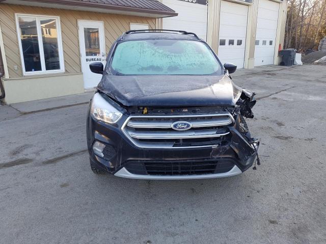 Photo 5 from auction – 2017 FORD ESCAPE SE with VIN 1FMCU9GD6HUE79054