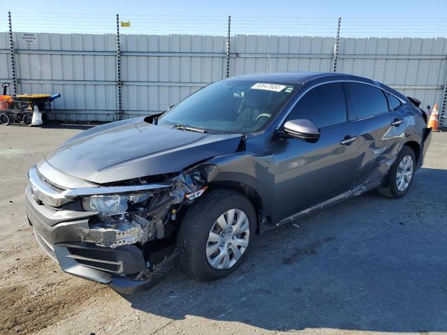 HONDA CIVIC LX 2018 with VIN 2HGFC2F50JH522691 - Photo from auction