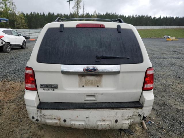 Photo 6 from auction – 2010 FORD ESCAPE LIM with VIN 1FMCU0E76AKD09495