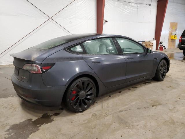 Снимка 3 от търг – 2022 TESLA MODEL 3 с VIN 5YJ3E1EC2NF337043