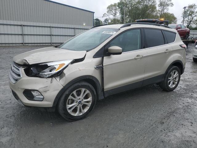FORD ESCAPE SE 2018 with VIN 1FMCU0GD4JUD14332 - Photo from auction