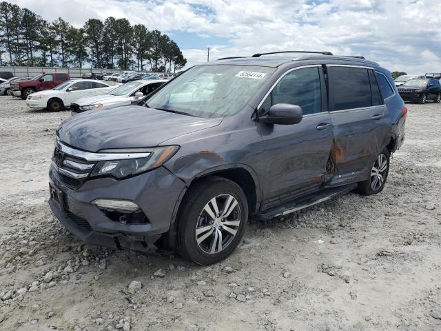 HONDA PILOT EXL 2017 with VIN 5FNYF6H58HB038075 - Photo from auction