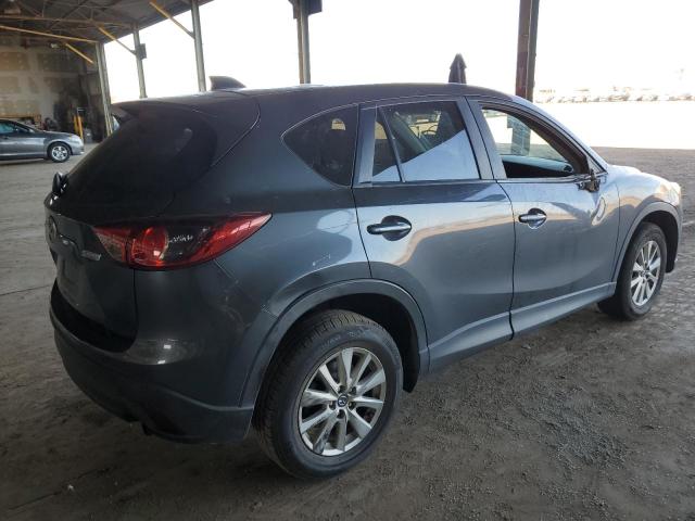 Photo 3 from auction – 2013 MAZDA CX-5 SPORT with VIN JM3KE2BE0D0144630