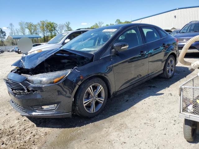 FORD FOCUS SE 2018 with VIN 1FADP3F22JL291761 - Photo from auction