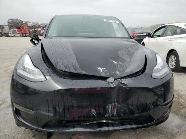 Photo 5 from auction – 2022 TESLA MODEL Y with VIN 7SAYGDEE0NA009011