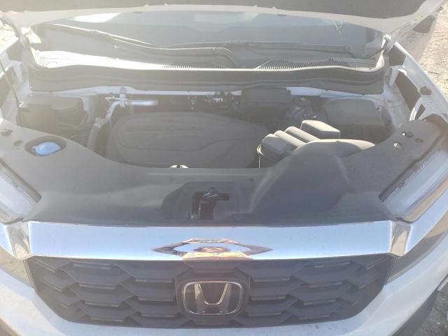 Photo 11 from auction – 2023 HONDA PASSPORT E with VIN 5FNYF8H52PB002523