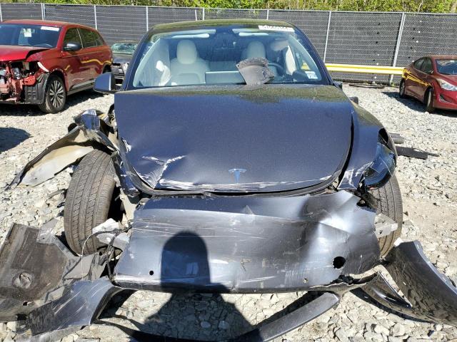 Photo 11 from auction – 2022 TESLA MODEL Y with VIN 7SAYGDEE3NF368632