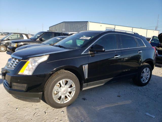 CADILLAC SRX LUXURY 2014 with VIN 3GYFNBE35ES565879 - Photo from auction