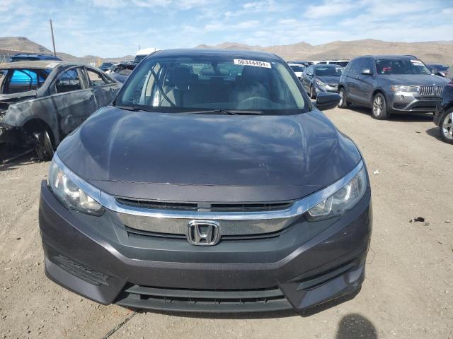 Photo 5 from auction – 2018 HONDA CIVIC LX with VIN 2HGFC2F58JH602319