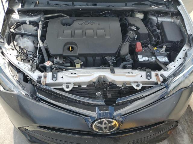 Photo 11 from auction – 2018 TOYOTA COROLLA L with VIN 5YFBURHE6JP851292