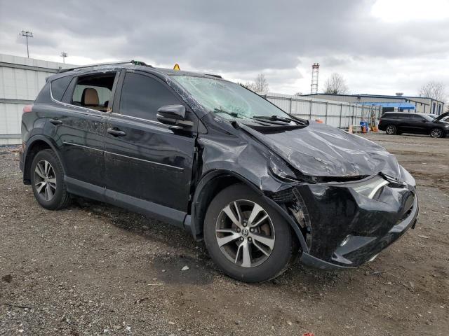 Photo 4 from auction – 2016 TOYOTA RAV4 XLE with VIN 2T3RFREV8GW510276