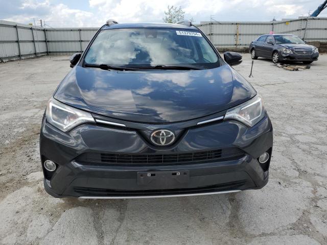 Photo 5 from auction – 2018 TOYOTA RAV4 XLE with VIN 2T3RFREV3JW766302
