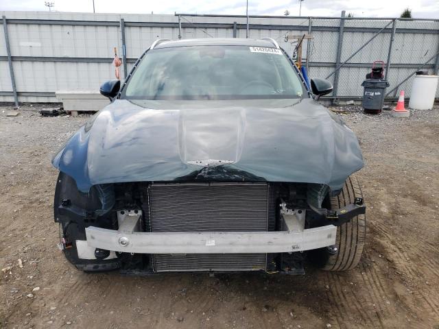 Photo 5 from auction – 2022 GENESIS GV70 BASE with VIN KMUMADTB0NU027165