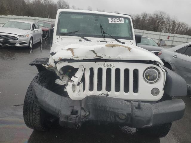 Photo 5 from auction – 2016 JEEP WRANGLER U with VIN 1C4BJWDG5GL146757