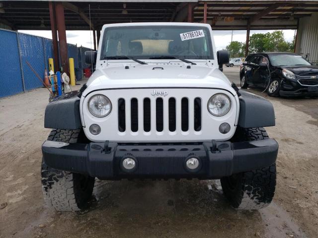 Photo 5 from auction – 2014 JEEP WRANGLER U with VIN 1C4BJWFG0EL290954