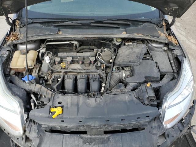 Photo 11 from auction – 2014 FORD FOCUS SE with VIN 1FADP3F24EL383170