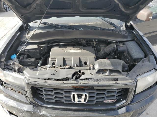 Photo 11 from auction – 2014 HONDA RIDGELINE with VIN 5FPYK1F72EB014666