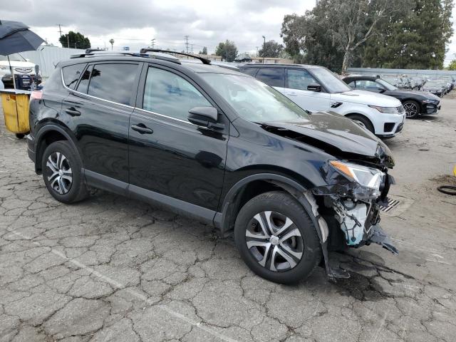 Photo 4 from auction – 2018 TOYOTA RAV4 LE with VIN 2T3ZFREV6JW435410