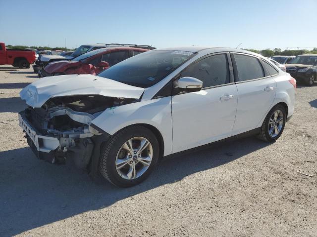 FORD FOCUS SE 2014 with VIN 1FADP3F20EL208074 - Photo from auction